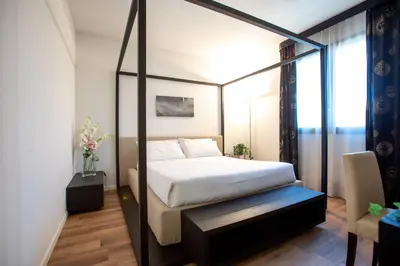Letto o letti in una camera di Matrix Hotel & Residence