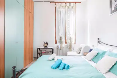 Letto o letti in una camera di CASA VACANZA LYUDMYLA