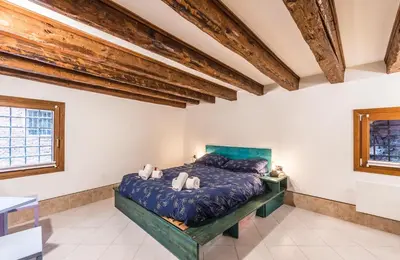 Letto o letti in una camera di Charme Home