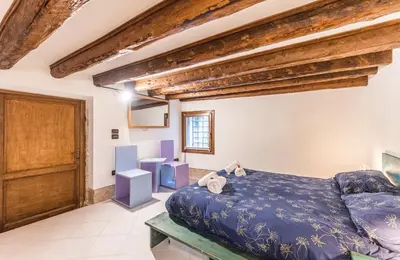Letto o letti in una camera di Charme Home
