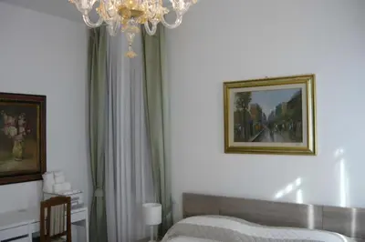 Letto o letti in una camera di Residenza Procuratie Uno