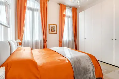 Letto o letti in una camera di Residenza Procuratie Due