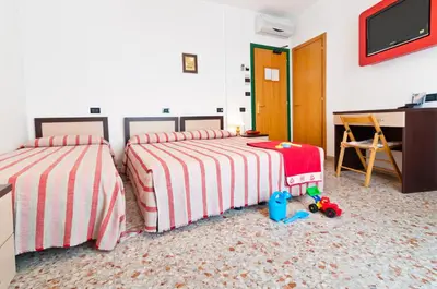 Letto o letti in una camera di Hotel Milan