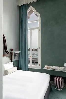 Letto o letti in una camera di Il Palazzo Experimental