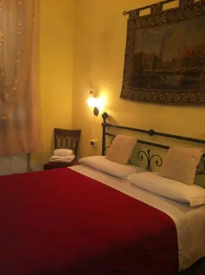 Letto o letti in una camera di B&B Ca' Dor