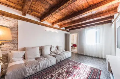 Letto o letti in una camera di Apartment Cà Brunilda-luxury penthouse with terrace