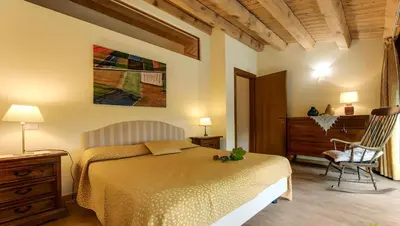 Letto o letti in una camera di Agriturismo Biologico La Buona Terra