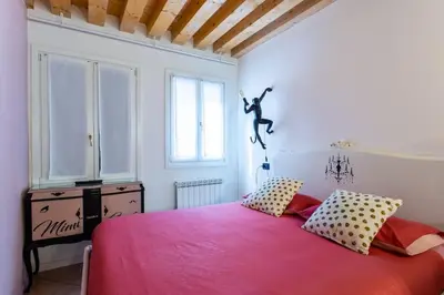 Letto o letti in una camera di La Bella Vita - Appartamenti Mimì & Cocò