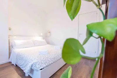 Letto o letti in una camera di CA ZULIAN amazing canal view apartment