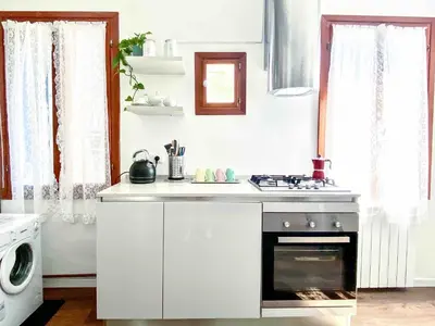 Cucina o angolo cottura di CA ZULIAN amazing canal view apartment