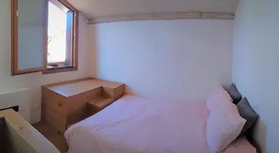 Letto o letti in una camera di Biennale House
