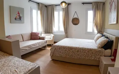 Letto o letti in una camera di LA CASA QUADRA