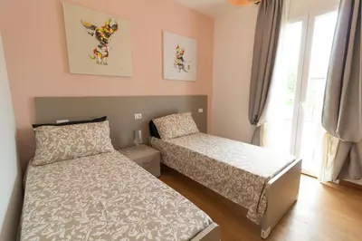 Letto o letti in una camera di LA CASA QUADRA