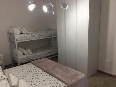 Letto o letti in una camera di Residence Alba d'Oro solo Famiglie e Coppie