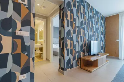 TV o dispositivi per l'intrattenimento presso Mosella Suite Hotel