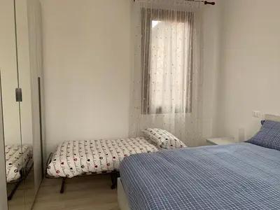 Letto o letti in una camera di Casa Roberta