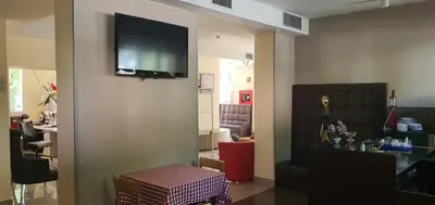 TV o dispositivi per l'intrattenimento presso Hotel Laguna Residence
