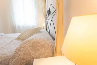 Letto o letti in una camera di VILLA MAGNOLIA