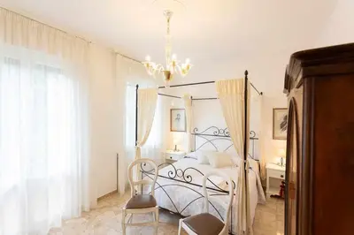 Letto o letti in una camera di VILLA MAGNOLIA