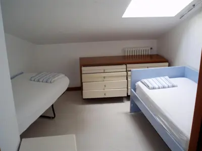 Letto o letti in una camera di VILLA DEI DOGI 2
