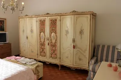 Letto o letti in una camera di casa vacanza Pina