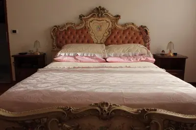 Letto o letti in una camera di casa vacanza Pina