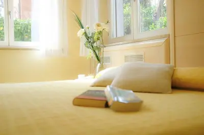 Letto o letti in una camera di Hotel Santa Lucia