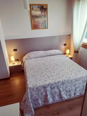 Letto o letti in una camera di Agriturismo le Colonie