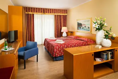 Letto o letti in una camera di Hotel Metropole