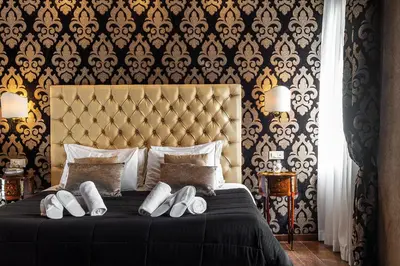 Letto o letti in una camera di Domus Superior