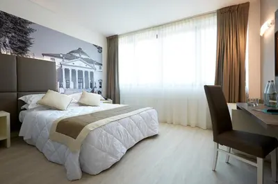 Letto o letti in una camera di Hotel Victoria