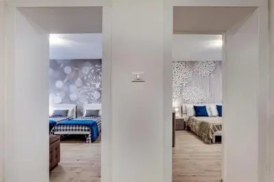 Letto o letti in una camera di White Flowers with Canal View by Wonderful Italy