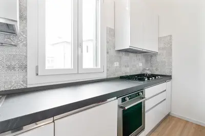 Cucina o angolo cottura di GuestHost - Prato della Valle Roomy Flat