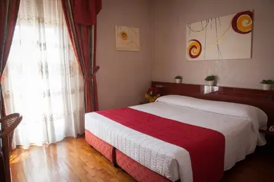Letto o letti in una camera di Hotel Master