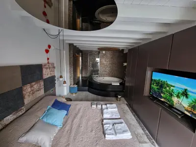 Letto o letti in una camera di Luxury Room & Private Spa - Rio Botteniga