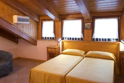 Letto o letti in una camera di Hotel Casanova