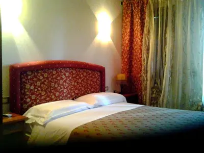 Letto o letti in una camera di Agriturismo MELO IN FIORE con camere e colazioni nella zona del Prosecco DOCG Asolo