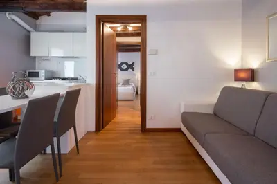 Cucina o angolo cottura di Design Palace Apartment by Wonderful Italy