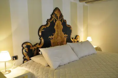 Letto o letti in una camera di Ca' Mariele