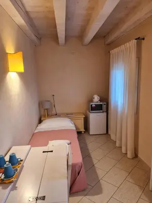 Letto o letti in una camera di Agriturismo San Michele
