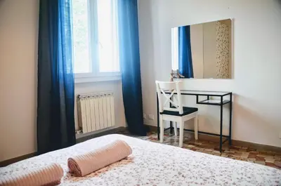 Letto o letti in una camera di NEW! Casa di Veneto, 15 min to Venice direct bus