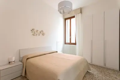 Letto o letti in una camera di Canaletto Apartments