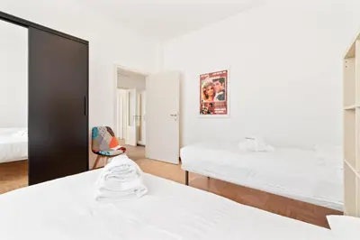 Letto o letti in una camera di GuestHost - Santa Rita Roomy Apartments