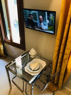 TV o dispositivi per l'intrattenimento presso Suite Dream on the River