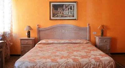 Letto o letti in una camera di Best Holidays Venice