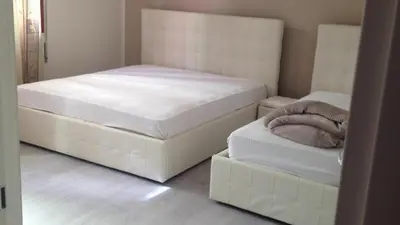 Letto o letti in una camera di Casa Bellemo