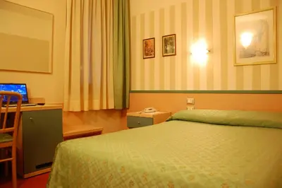 Letto o letti in una camera di Hotel Belie