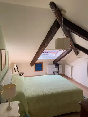 Letto o letti in una camera di Casa Tella