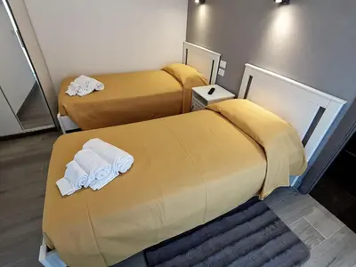 Letto o letti in una camera di Casa Belfiore Vicenza Medici 23