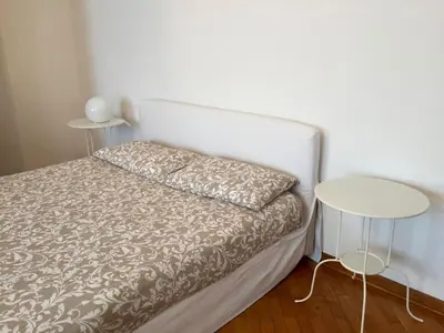Letto o letti in una camera di Casa Mamma Mia